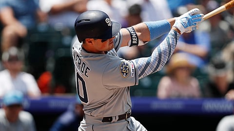Padres’ Hunter Renfroe connects for a two-run home run off Rockies’ Peter Lambert on June 16 (David Zalubowski)