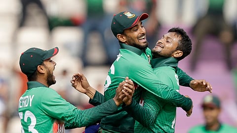Bangladesh’s Shakib Al Hasan, right, celebrates taking the wicket of Afghanistan’s Mohammad Nabi during the Cricket World Cup match between Bangladesh and Afghanistan at the Hampshire Bowl in Southampton, England, Monday, June 24, 2019. (AP Photo/Matt Dunham)