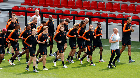 Netherlands’ Virgil Van Dijk (far right), leads his teammates during a training session in Braga, Portugal on June 8 (Armando Franca)
