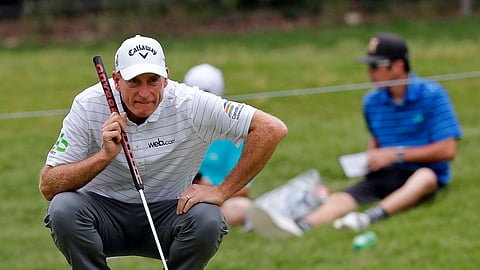 Jim Furyk reads the green for his putt on the first hole during the third round of the Charles Schwab Challenge  May 25 (Bob Booth/Star-Telegram)