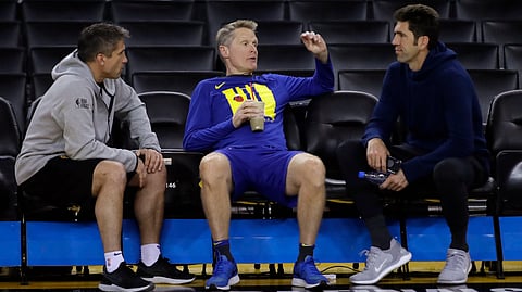 Warriors head coach Steve Kerr is flanked by director of sports medicine Dr. Rick Celebrini (left) and general manager Bob Myers during Practice on June 6 (Ben Margot)