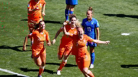 Netherlands’ Stefanie Van Der Gragt, front, celebrates after scoring her side’s second goal during the Women’s World Cup quarterfinal soccer match between Italy and the Netherlands, in Valenciennes, France, Saturday, June 29, 2019. (AP Photo/Francois Mori)