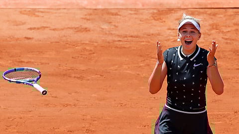 Amanda Anisimova of the U.S. celebrates winning her quarterfinal match of the French Open tennis tournament against Romania’s Simona Halep last June. She wasn't as happy today in West Palm Beach.(AP Photo/Christophe Ena)