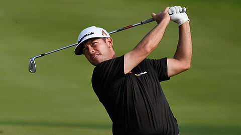 Chez Reavie hits his second shot on the 18th hole during the third round of the Travelers Championship golf tournament, Saturday, June 22, 2019, in Cromwell, Conn.