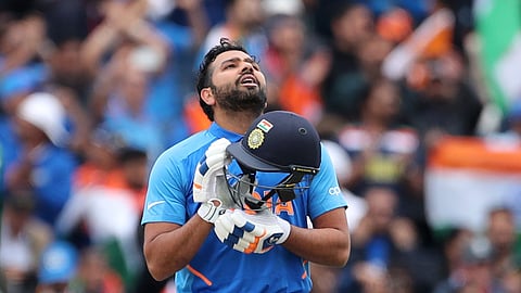 India’s Rohit Sharma looks skywards to celebrate scoring a century during the Cricket World Cup match between India and Pakistan at Old Trafford in Manchester, England, Sunday, June 16, 2019. (AP Photo/Aijaz Rahi)