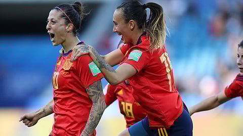 Spain’s Jennifer Hermoso (left) celebrates with teammates after scoring on a penalty shot June 8 (Francisco Seco)
