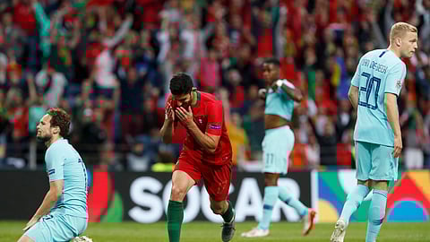 Portugal’s Goncalo Guedes, centre, reacts after scoring his team’s first goal during the UEFA Nations League final soccer match between Portugal and Netherlands at the Dragao stadium in Porto, Portugal, Sunday, June 9, 2019. (AP Photo/Armando Franca)