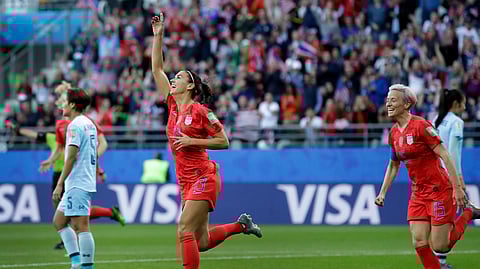 United States’ Alex Morgan, left, celebrates after scoring the opening goal during the Women’s World Cup Group F soccer match between United States and Thailand at the Stade Auguste-Delaune in Reims, France, Tuesday, June 11, 2019.
