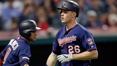 Twins’ Max Kepler (26) is congratulated by Jorge Polanco after Kepler hit a solo home run on June 6 (Tony Dejak)