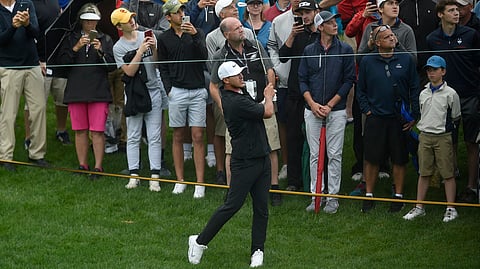 Brooks Koepka tees off on the 10th hole during the first round play at the Travelers Championship on June 20 (Brad Horrigan/Hartford Courant)