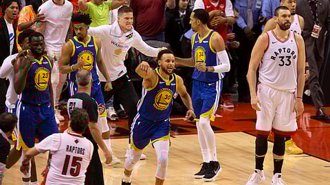 Golden State Warriors’ Stephen Curry (30) celebrates at the final buzzer as his team defeated the Toronto Raptors 106-105 in Game 5 of the NBA Finals in Toronto on Monday June 10, 2019. (Chris Young/The Canadian Press via AP)