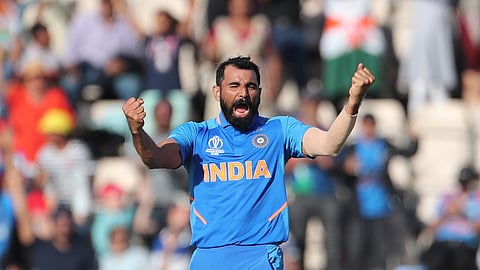 India’s Mohammed Shami celebrates his hat-trick after dismissing Afghanistan’s Mujeeb Ur Rahman during the Cricket World Cup match between India and Afghanistan at the Hampshire Bowl in Southampton, England, Saturday, June 22, 2019. (AP Photo/Aijaz Rahi)