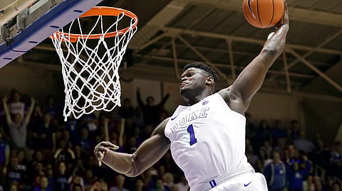 In this Jan. 5, 2019, file photo, Duke’s Zion Williamson dunks during the second half of an NCAA college basketball game against Clemson.