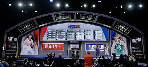 The draft board at the Barclays Center displays the picks for the first round of the NBA Draft on June 20 (Julio Cortez)