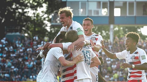 Team USA U20 celebrates a World Cup win over France.