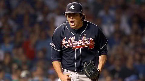 Braves relief pitcher Luke Jackson reacts after striking out Cubs’ David Bote to end the June 25 game (Charles Rex Arbogast)