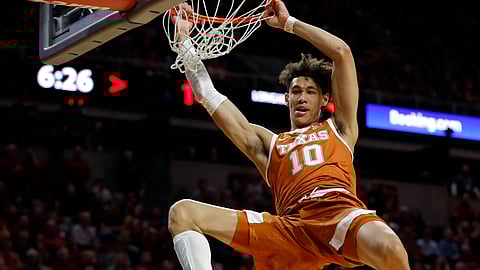 FILE - In this Feb. 2, 2019, file photo, Texas forward Jaxson Hayes (10) dunks the ball during the first half of an NCAA college basketball game, in Ames, Iowa. (AP Photo/Charlie Neibergall, File)