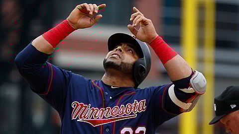Twins’ Nelson Cruz after homering on June 9 (Paul Sancya)