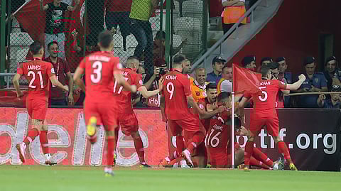 Turkey players celebrate after Cengiz Under scored a goal during the Euro 2020 Group H qualifying soccer match between Turkey and France in Konya, Turkey, Saturday June 8, 2019. (AP Photo)