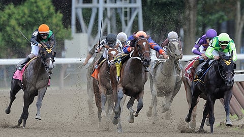 Horses head down the stretch at Saratoga