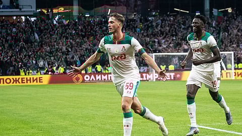 Lokomotiv Moscow's Aleksei Miranchuk, center, celebrates after scoring his team's third goal against Zenit St. Petersburg during the Russian Super Cup soccer match in Moscow, Russia, Saturday, July 6, 2019. Lokomotiv won 3-2.