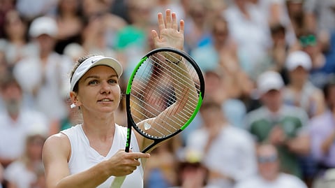 Romania’s Simona Halep celebrates after beating Belarus’ Victoria Azarenka in a Women’s singles match during day five of the Wimbledon Tennis Championships in London, Friday, July 5, 2019. (AP Photo/Ben Curtis)