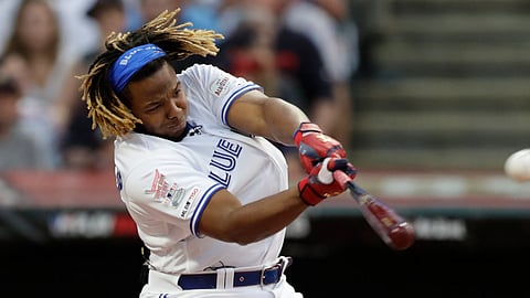 Blue Jays’ Vladimir Guerrero Jr. belts one of the many home runs hit Monday night (Tony Dejak)