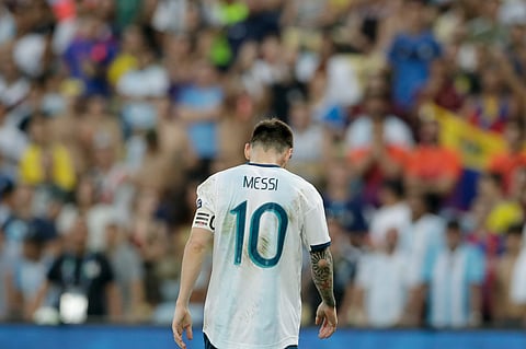 Argentina’s Lionel Messi walks the field during a Copa America quarterfinal soccer match against Venezuela at the Maracana stadium in Rio de Janeiro, Brazil, Friday, June 28, 2019. (AP Photo/Leo Correa)