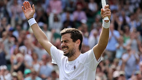 Argentina’s Guido Pella celebrates after beating South Africa’s Kevin Anderson in a Men’s singles match during day five of the Wimbledon Tennis Championships in London, Friday, July 5, 2019. (AP Photo/Ben Curtis)