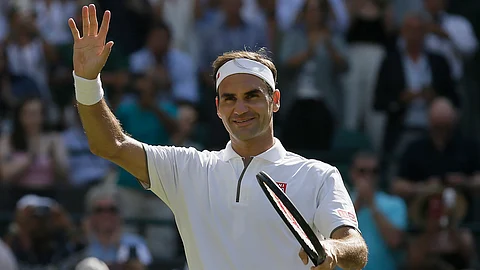Switzerland’s Roger Federer celebrates after beating Britain’s Jay Clarke in a Men’s singles match during day four of the Wimbledon Tennis Championships in London, Thursday, July 4, 2019. 