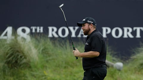 Ireland's Shane Lowry acknowledges the crowd after he completed his second round on the 18th green in British Open Golf Championships at Royal Portrush in Northern Ireland, Friday, July 19, 2019.(AP Photo/Matt Dunham)