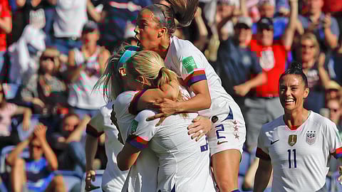 United States teammates celebrate after teammate Julie Ertz (left, headband) scored against Chile on June 16 (Alessandra Tarantino)