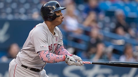 Boston’s Rafael Devers watches his first-inning home run against Toronto on July 4 (Fred Thornhill/The Canadian Press via AP)