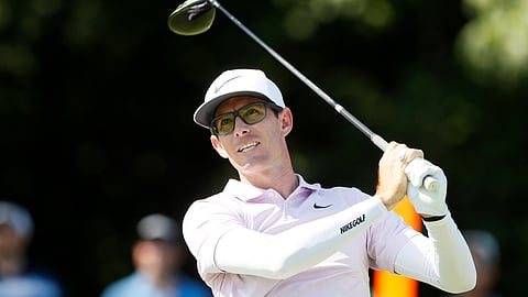 Dylan Frittelli hits off the 18th tee during the final round of the John Deere Classic golf tournament, Sunday, July 14, 2019, at TPC Deere Run in Silvis, Ill. (AP Photo/Charlie Neibergall)