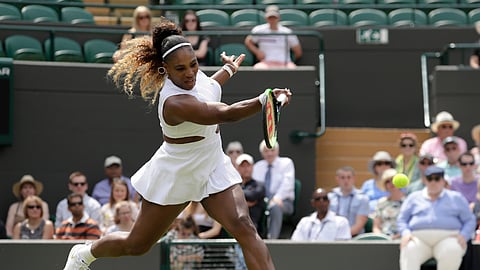 United States’ Serena Williams returns the ball to Spain’s Carla Suarez Navarro in a women’s singles match during day seven of the Wimbledon Tennis Championships in London, Monday, July 8, 2019. 