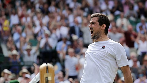 Argentina’s Guido Pella celebrates after winning a point against South Africa’s Kevin Anderson in a Men’s singles match during day five of the Wimbledon Tennis Championships in London, Friday, July 5, 2019. 