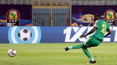Senegal’s Sadio Mane scores on a penalty kick against Kenya on  July 1(Hassan Ammar)
