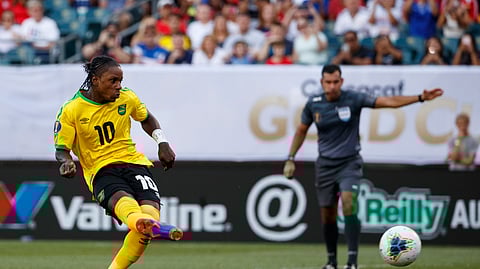 Jamaica’s Darren Mattocks scores a goal on a penalty kick during the second half of a CONCACAF Gold Cup soccer match against Panama, Sunday, June 30, 2019, in Philadelphia. (AP Photo/Matt Slocum)