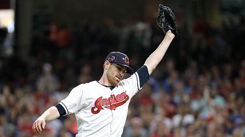 Indians’ Shane Bieber reacts after striking out Braves’ Ronald Acuna Jr. to end the fifth inning in the All-Star Game on July 9 (John Minchillo)