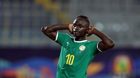 Senegal’s Sadio Mane reacts after missing a chance to score during the African Cup of Nations group D soccer match between Kenya and Senegal in 30 June Stadium in Cairo, Egypt, Monday, July 1, 2019. (AP Photo/Hassan Ammar)