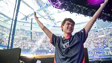 In this Sunday, July 28, 2019 photo provided by Epic games, Kyle Giersdorf reacts after he won the Fortnite World Cup solo finals in New York. Giersdorf, of Pottsgrove, Pa. who goes by the name "Bugha" when competing, racked up the most points and won $3 million as the first Fortnite World Cup solo champion. (Epic Games via AP)