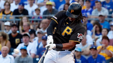 FILE - In this July 1, 2019, file photo, Pittsburgh Pirates' Josh Bell hits a three-run home run off Chicago Cubs starting pitcher Adbert Alzolay during the first inning of a baseball game in Pittsburgh. Will he hit another home run tonight? (AP Photo/Gene J. Puskar, File)