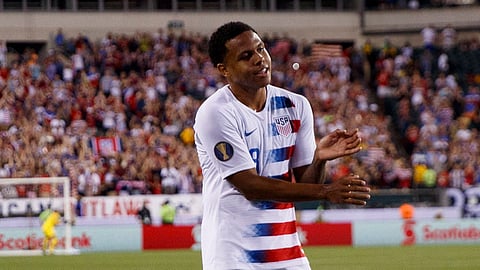 United States’ Weston McKennie (left) and Christian Pulisic celebrate after McKennie’s goal against Curacao on June 30 (Matt Slocum)