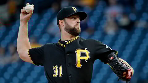 Pittsburgh Pirates starting pitcher Jordan Lyles delivers during the first inning of a baseball game against the St. Louis Cardinals in Pittsburgh, Wednesday, July 24, 2019. (AP Photo/Gene J. Puskar)