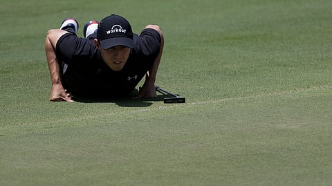 Matthew Fitzpatrick, of England, views his putt on the seventh green during the second round of the World Golf Championships-FedEx St. Jude Invitational Friday, July 26, 2019, in Memphis, Tenn. (AP Photo/Mark Humphrey)