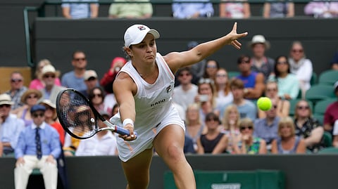 Australia’s Ashleigh Barty returns to China’s Saisai Zheng in their Women’s singles match during day two of the Wimbledon Tennis Championships in London, Tuesday, July 2, 2019.