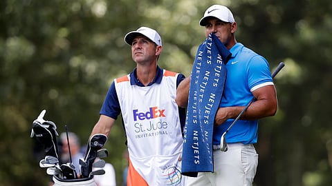 Brooks Koepka prepares to hit on the third fairway during the final round of the World Golf Championships-FedEx St. Jude Invitational, Sunday, July 28, 2019, in Memphis, Tenn. (AP Photo/Mark Humphrey)