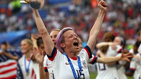 United States’ Megan Rapinoe holds the trophy celebrating at the end of the Women’s World Cup final soccer match between US and The Netherlands at the Stade de Lyon in Decines, outside Lyon, France, Sunday, July 7, 2019. The US defeated the Netherlands 2-0. (AP Photo/Francisco Seco)