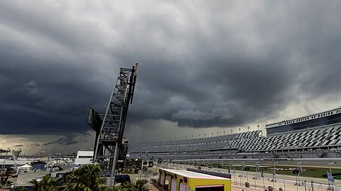 Storm clouds move in over Daytona International Speedway causing a delay of events before the NASCAR Xfinity race on July 5 (John Raoux)