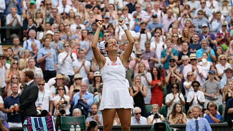 Czech Republic’s Barbora Strycova celebrates winning a women’s quarterfinal match against Britain’s Johanna Konta on day eight of the Wimbledon Tennis Championships in London, Tuesday, July 9, 2019. (AP Photo/Kirsty Wigglesworth)